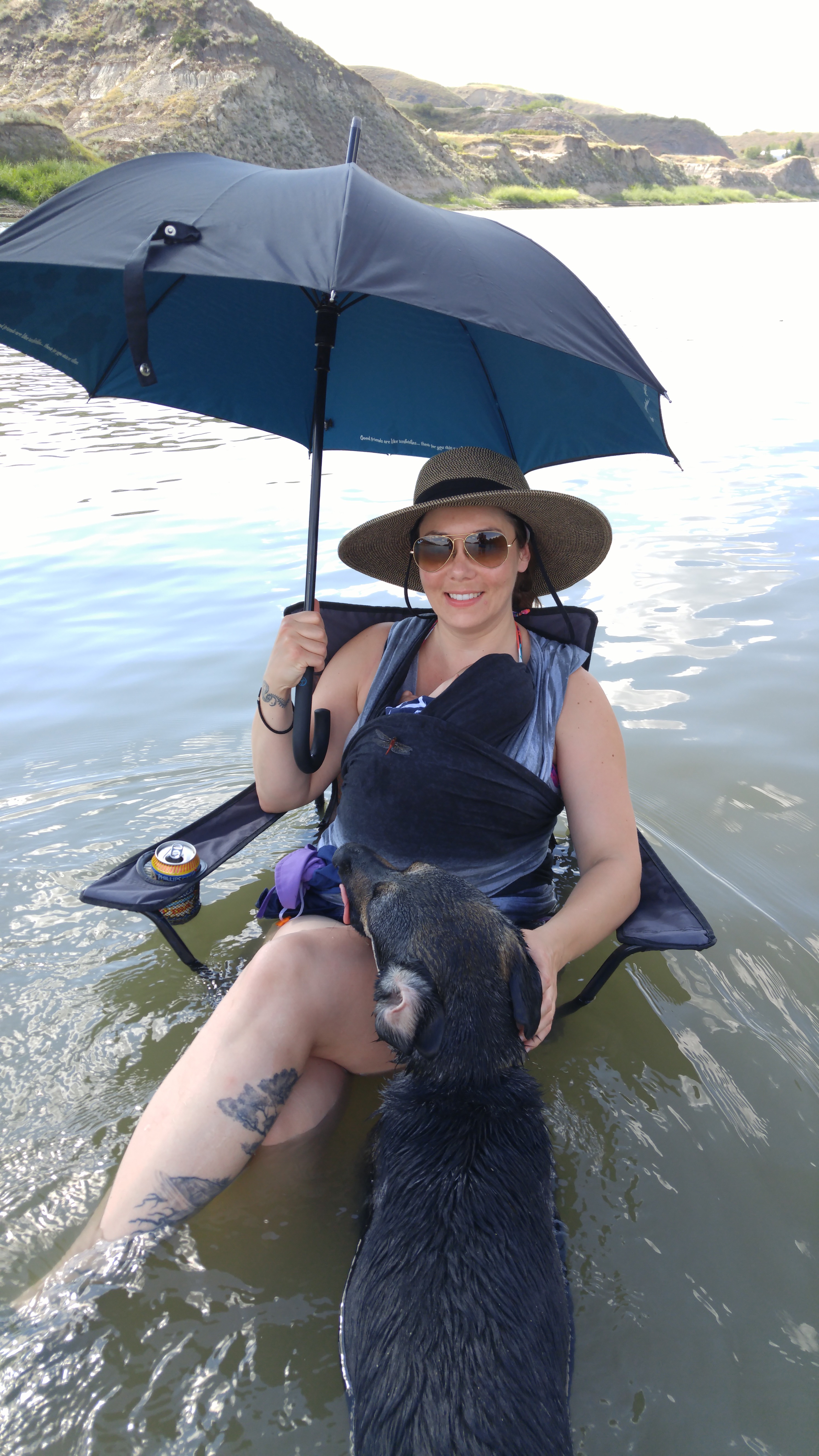 Janet and Ewan sitting in the Red Deer River