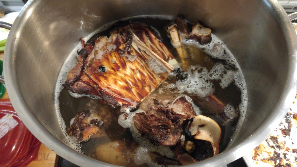 Stock pot with roasted bones